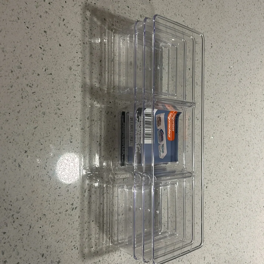 3 plastic organizers by Essentials.  All three are identical. Made in China.